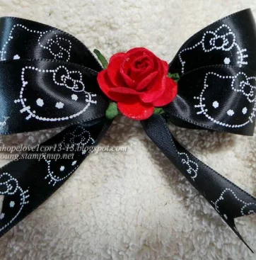 Black handmade bow from Little C’s Creations